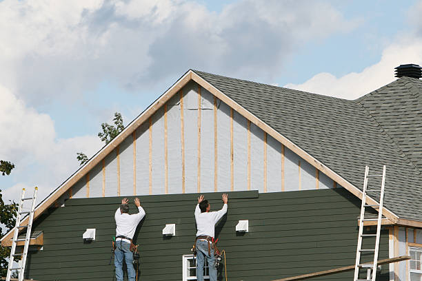 Professional Emergency Siding Repair technician working in West Roxbury, MA